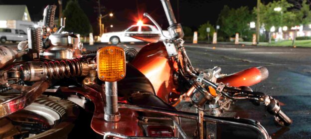 Motorcycle involved in a car crash