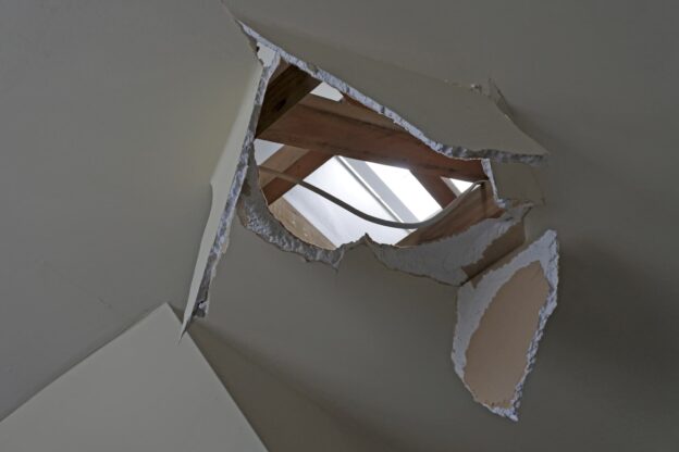 Ceiling with large hole.